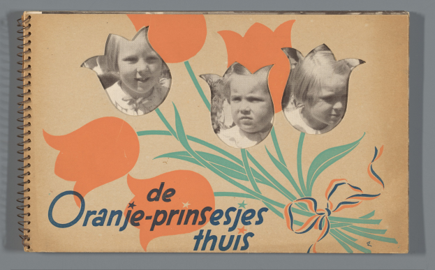 Ein Buch mit einem Cover, das drei lächelnde Kinder verschiedenen Alters und Geschlechts zeigt, das auf einer ebenen Fläche liegt und lesbare Text enthält.