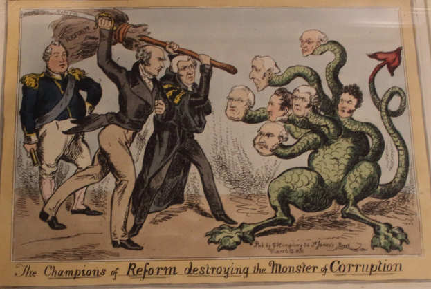 Eine Karikatur auf einem Blatt, das Reformchampions zeigt, die ein Monster namens 'Korruption' besiegen, mit dem Text 'Die Reformchampions zerstören das Monster der Korruption'.