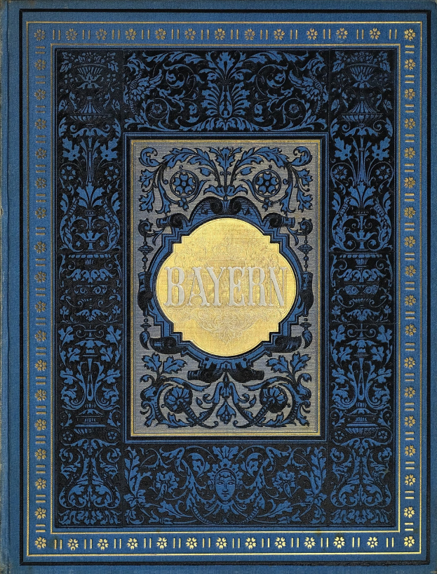 Ein blau-goldenes Buch mit dem Wort 'Bayern' auf dem Cover, verziert mit kunstvollen Ornamenten.