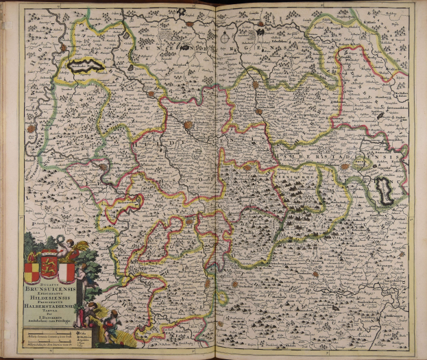 Offenes Buch mit detaillierter Deutschlandkarte, die geografische Merkmale wie Flüsse, Berge und Städte zeigt, begleitet von beschreibendem Text.
